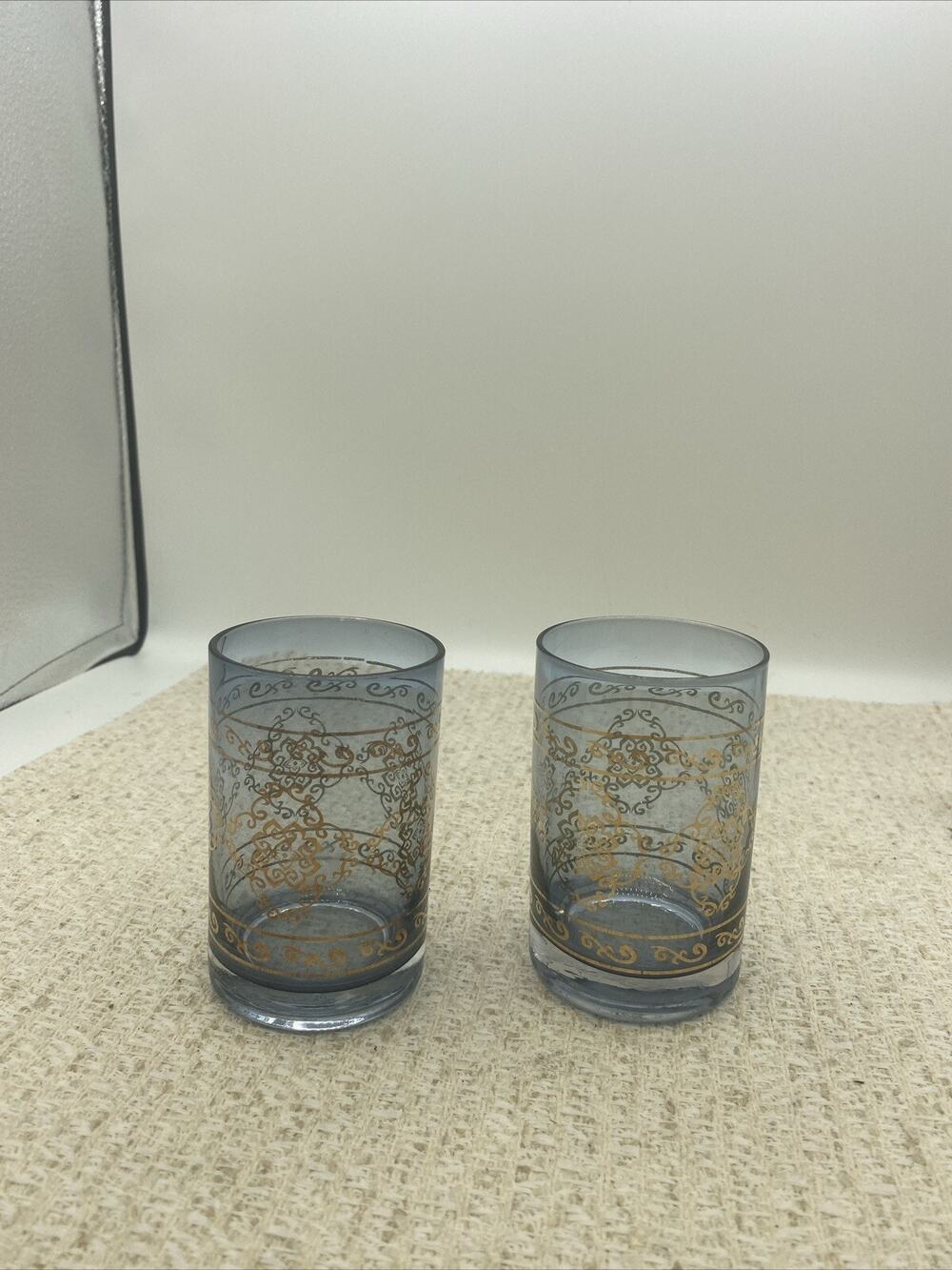 glass cups blue W/gold embellishment 4” Tall set of 2